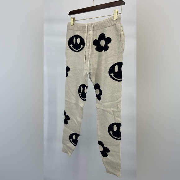 Women’s Dressed in LALA Off White and Black Smiley Face Cropped Jogger Pants - Picture 5 of 8